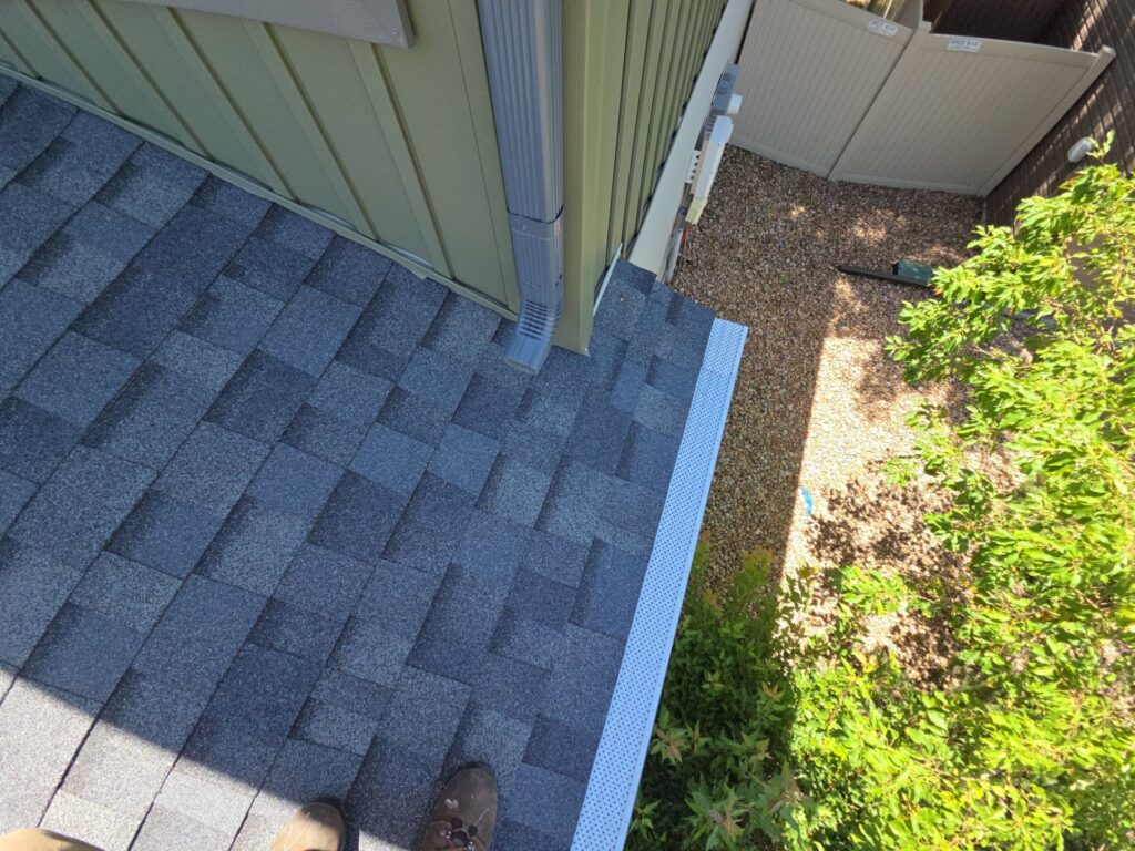 New gutter installation on residential home with clean fascia