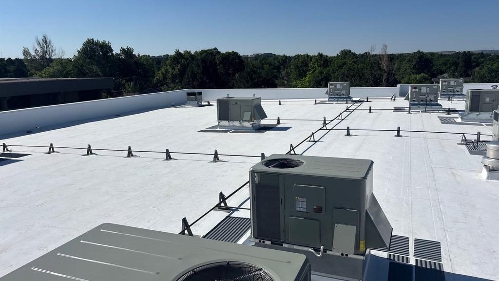 Commercial roofing installation aerial view of completed flat roof