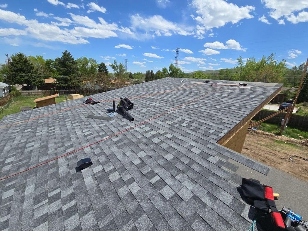 New asphalt shingle roof installation on a residential home in Colorado